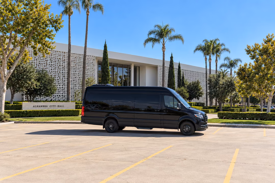 Alhambra 14 passenger Sprinter limo rental exterior