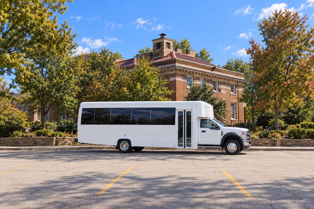 Fayetteville AR 25 passenger party bus rental exterior
