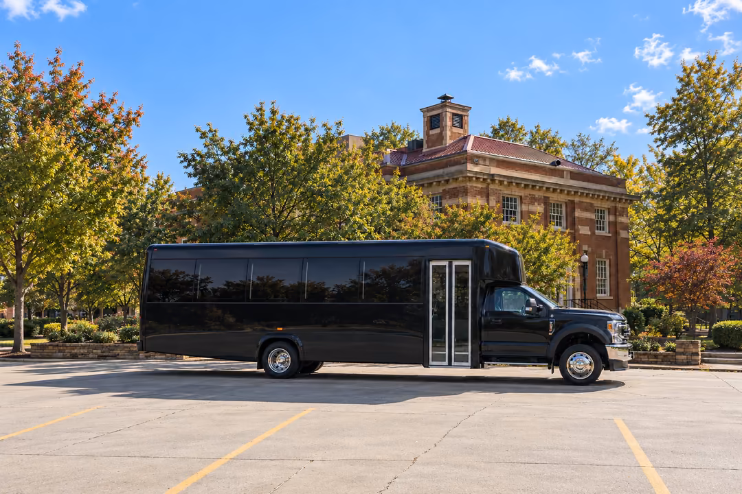 Fayetteville AR 28 passenger party bus rental exterior