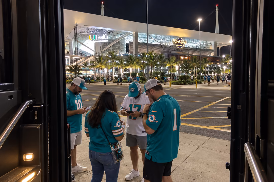 Sports game day party bus rentals near North Miami